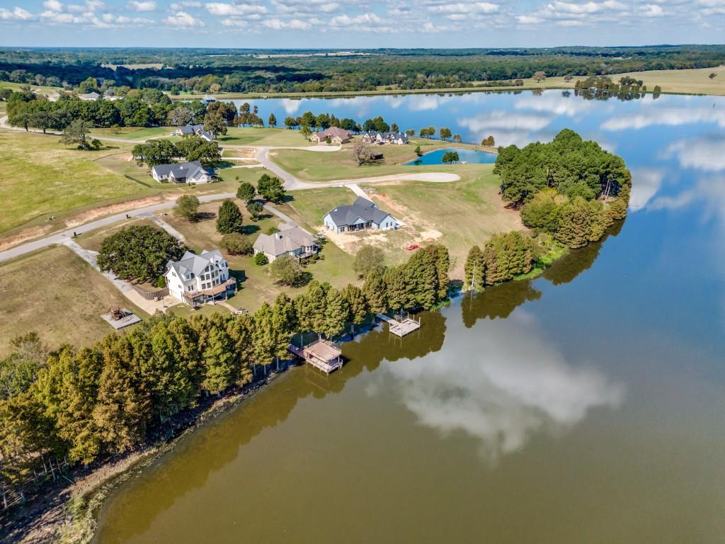 5848 Lago Vista Athens, TX 75752 - Photo 29 of 33 a view of a lake with a mountain