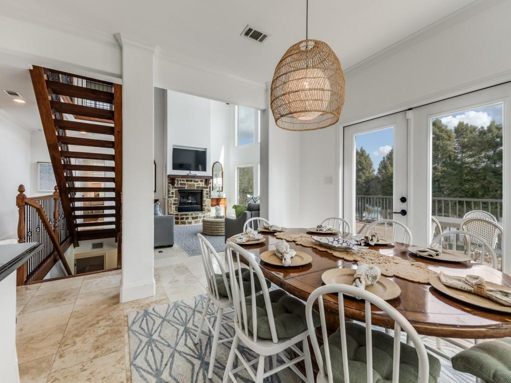 5848 Lago Vista Athens, TX 75752 - Photo 9 of 33 a view of a dining room with furniture window and wooden floor