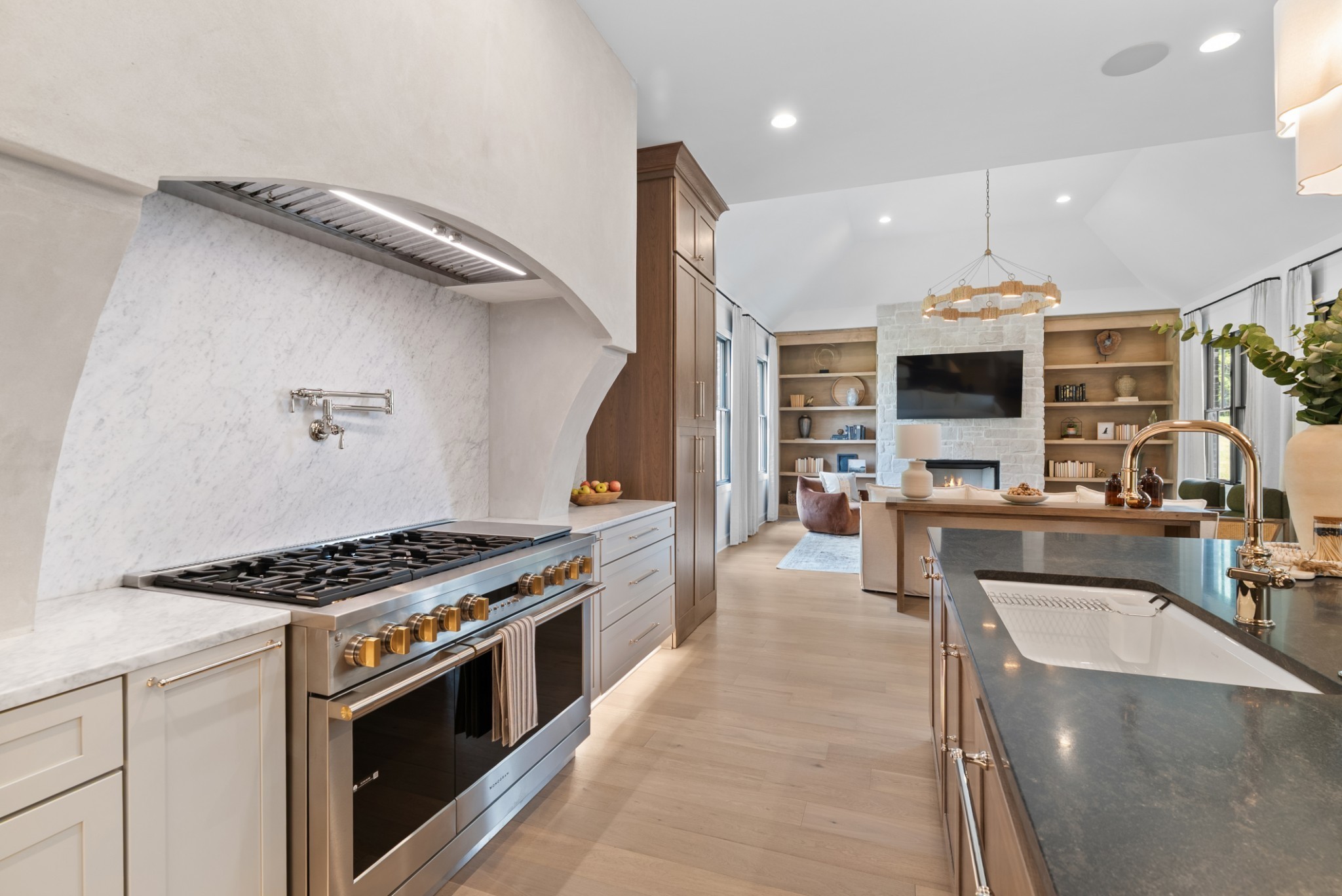 9917 Elland Road Brentwood, TN 37027 - Photo 25 of 99 a kitchen with stainless steel appliances granite countertop a stove and a sink