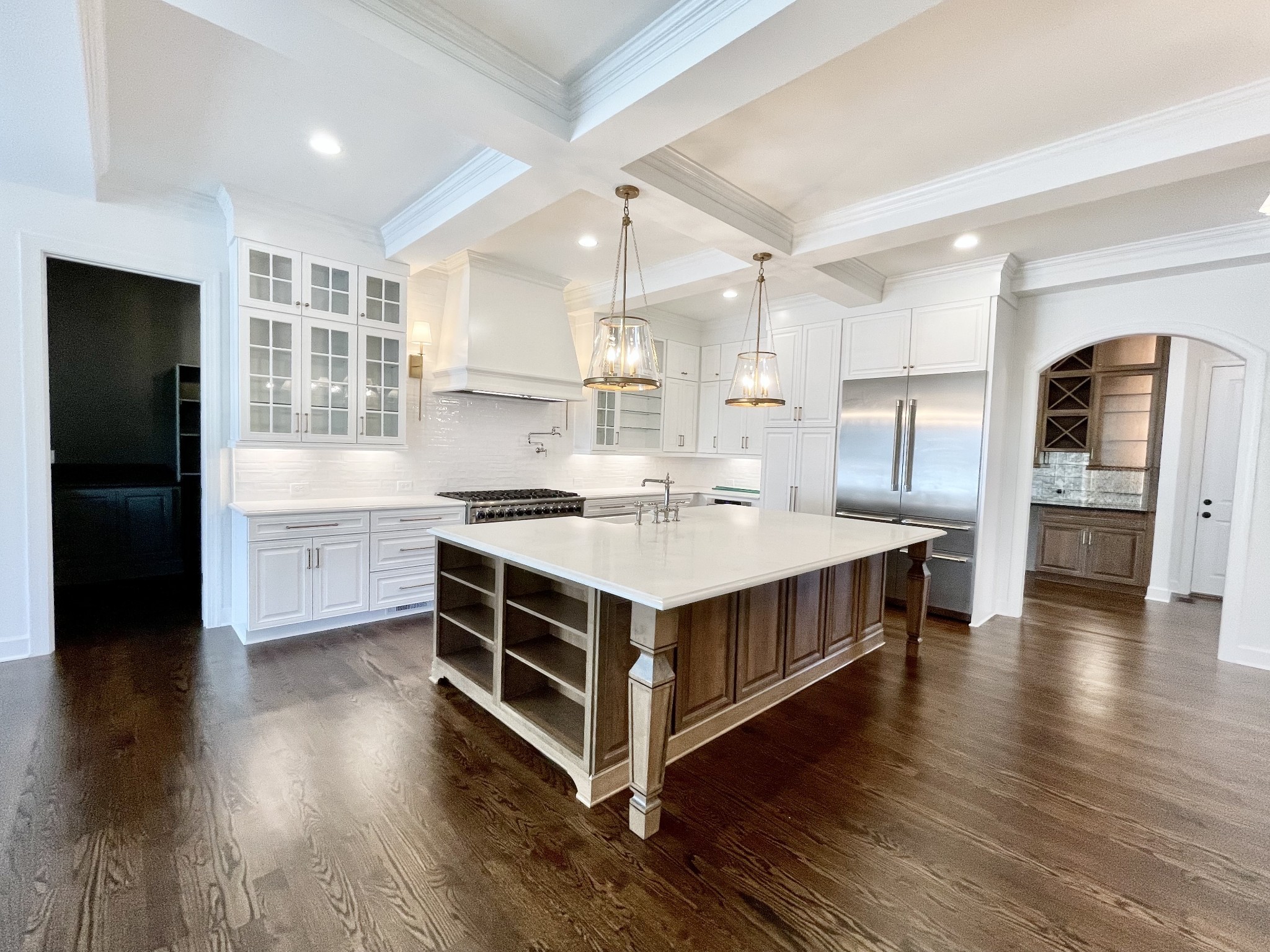 9917 Elland Road Brentwood, TN 37027 - Photo 32 of 99 a kitchen with stainless steel appliances a sink and cabinets