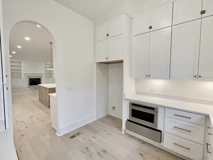 a view of livingroom with furniture and wooden floor