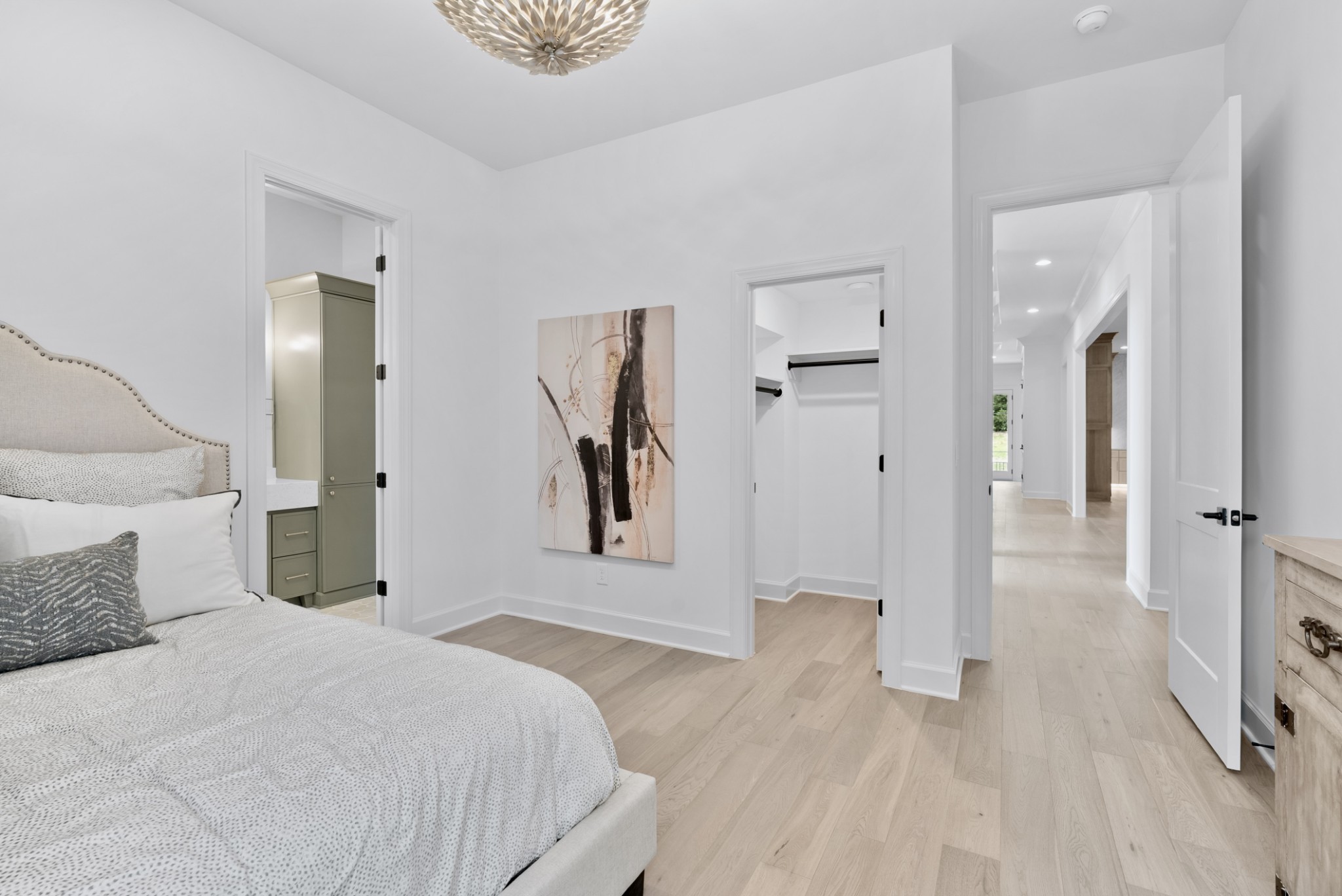 9917 Elland Road Brentwood, TN 37027 - Photo 58 of 99 a bedroom with a bed and a painting on the wall