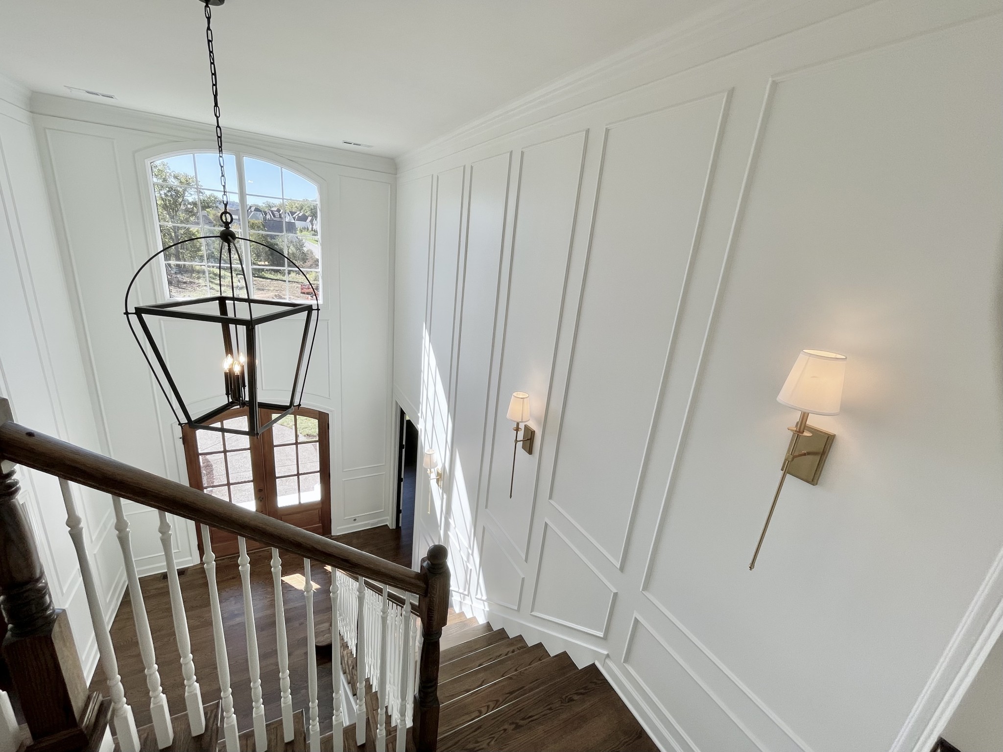 9917 Elland Road Brentwood, TN 37027 - Photo 76 of 99 a view of a hallway view with wooden floor and staircase