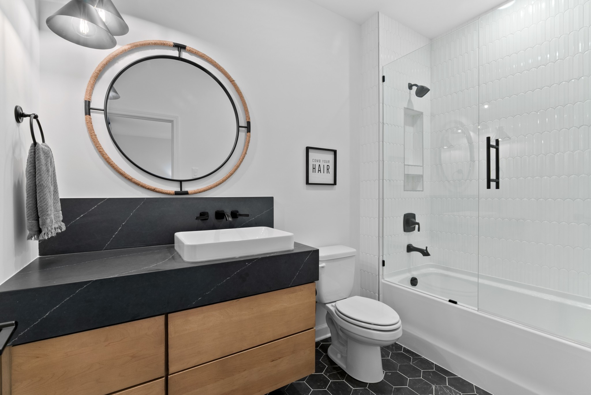 9917 Elland Road Brentwood, TN 37027 - Photo 82 of 99 a bathroom with a sink a toilet and a mirror