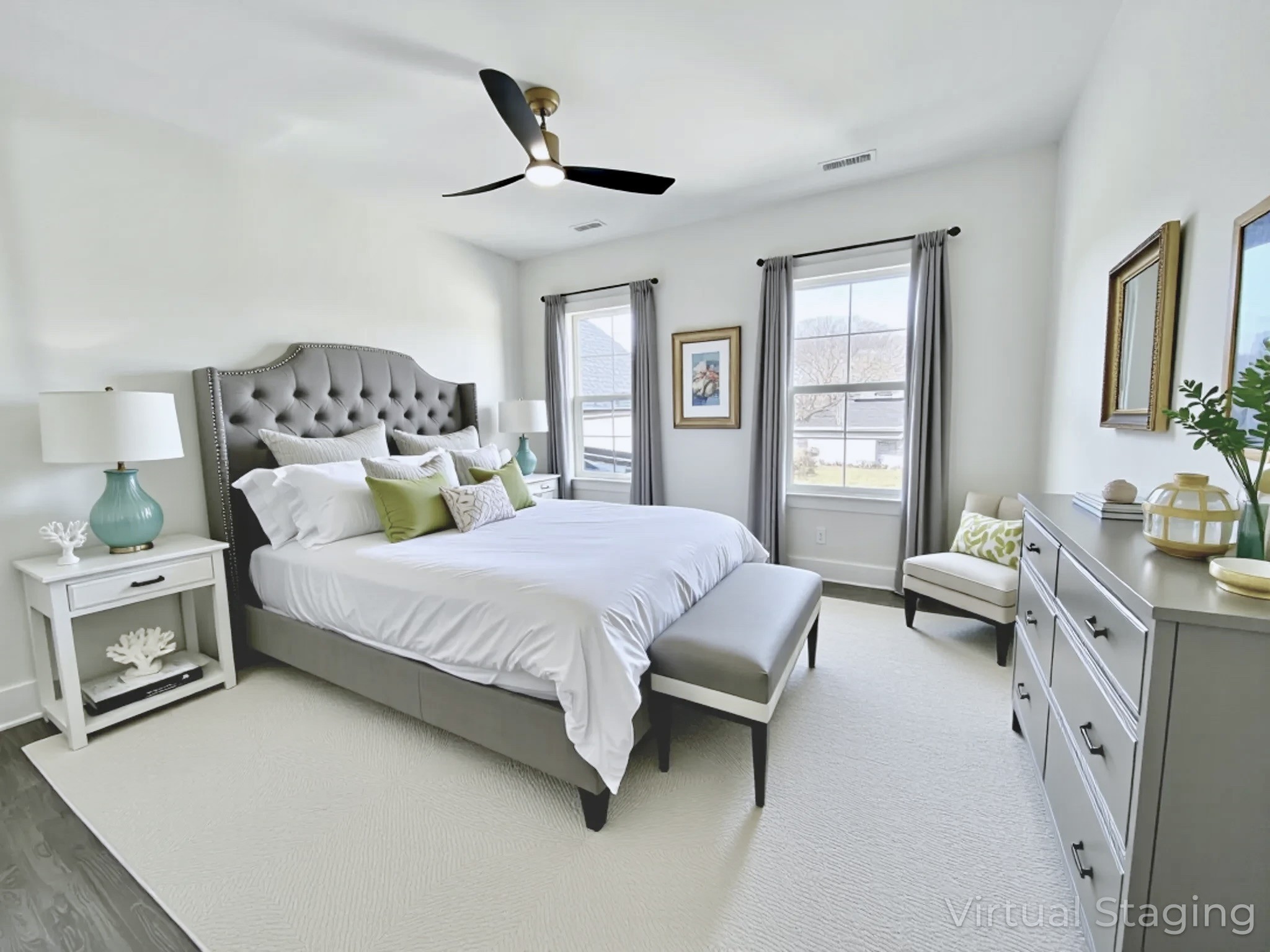 9917 Elland Road Brentwood, TN 37027 - Photo 84 of 99 a spacious bedroom with a bed a couch and a large window