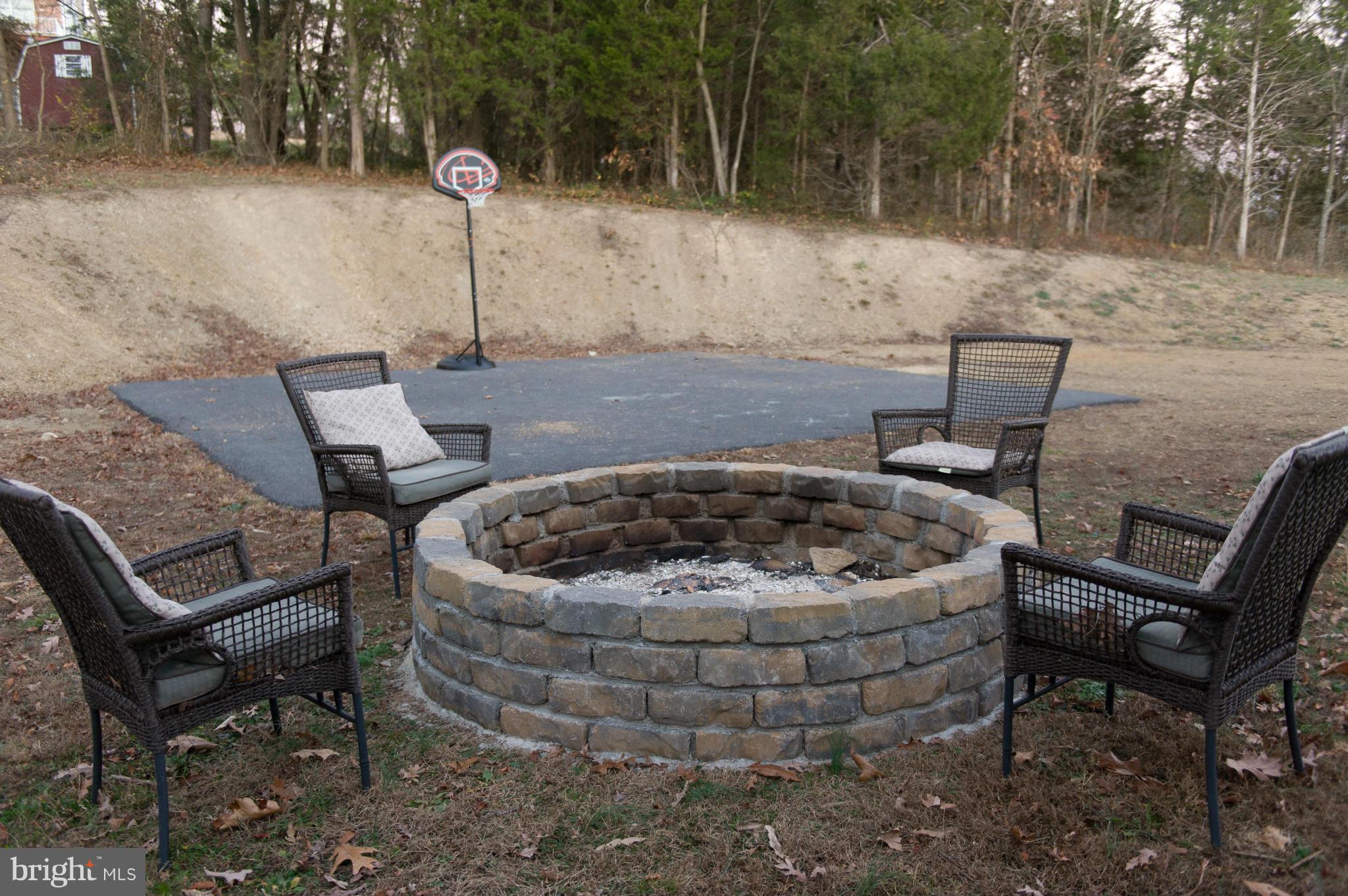 1204 Ripple Court Front Royal, VA 22630 - Photo 23 of 24 Relax by your firepit and enjoy a game of hoops