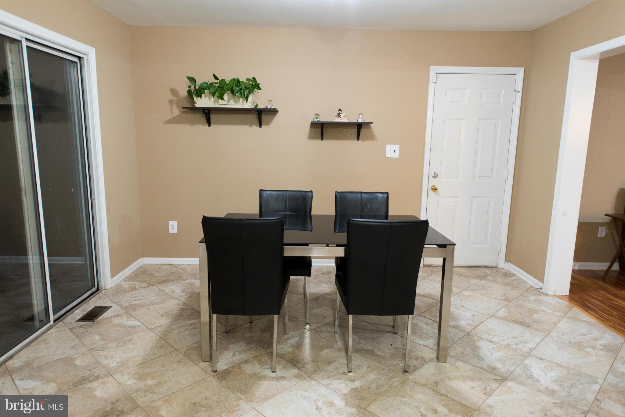Kitchen eat in with walkout to yard / grill area
