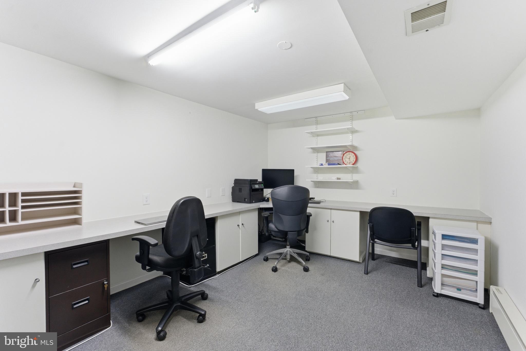 2100 Edgewater Parkway Silver Spring, MD 20903 - Photo 39 of 46 a view of a workspace with furniture and a window