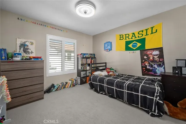 a room with a bed and a window