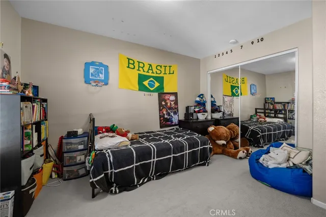 a bed room with bed and a couch