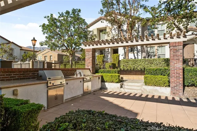 a large white building with a white roof and front door