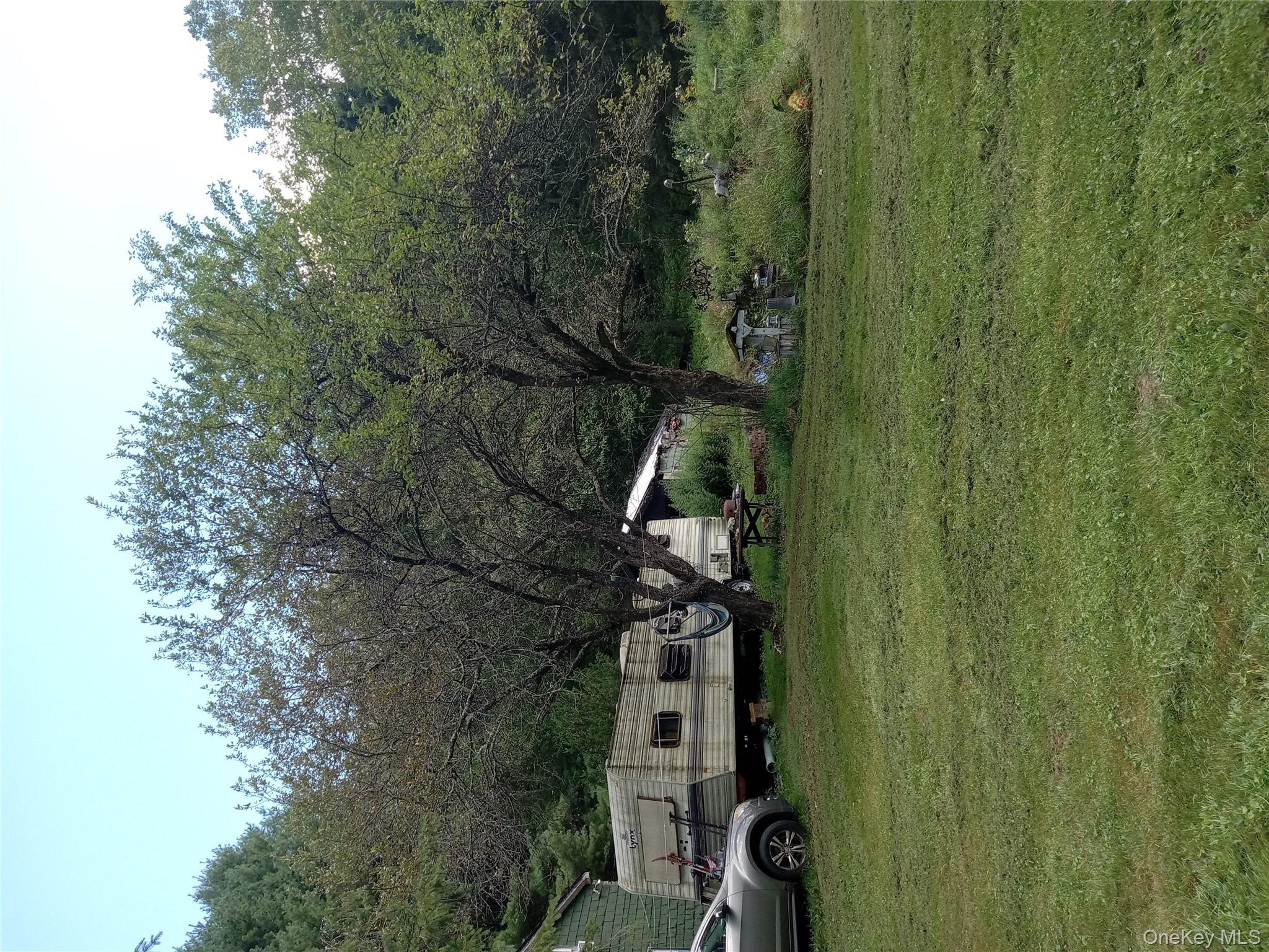834 Cooley Road Parksville, NY 12768 - Photo 22 of 28 a view of a car park in front of house