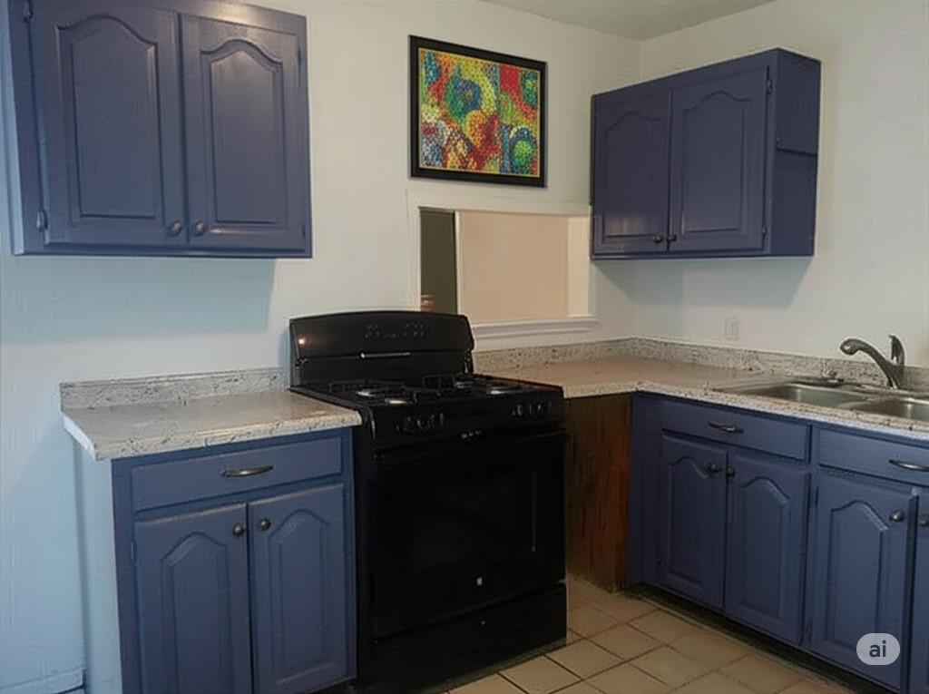 511 Rogers Road Newark, TX 76071 - Photo 9 of 19 Kitchen featuring black gas stove, blue cabinetry, and light countertops