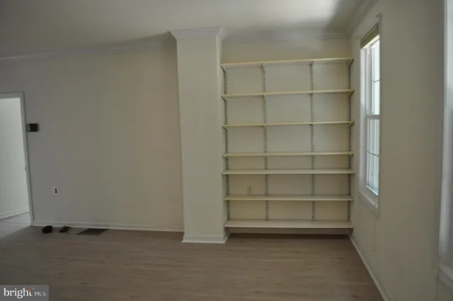 a view of an empty room with empty racks