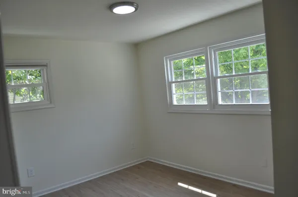 an empty room that has a window