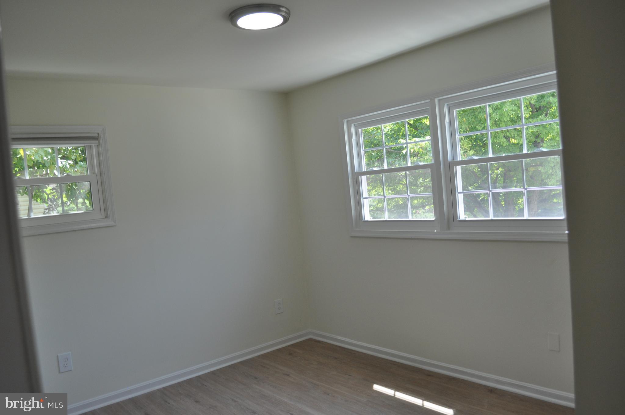 4302 Locust Lane Bethesda, MD 20816 - Photo 19 of 25 an empty room with a window
