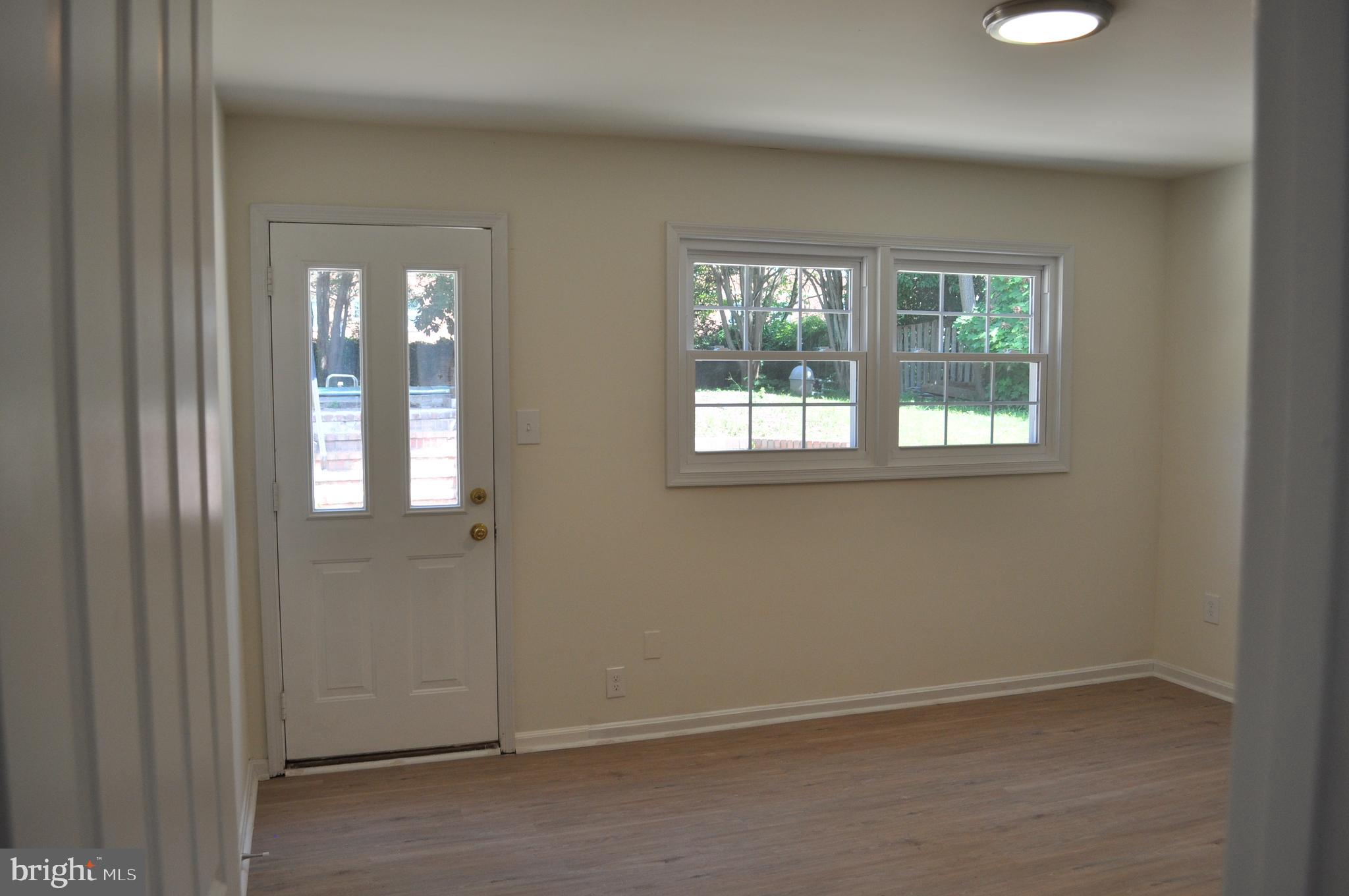 4302 Locust Lane Bethesda, MD 20816 - Photo 20 of 25 an empty room that has a window