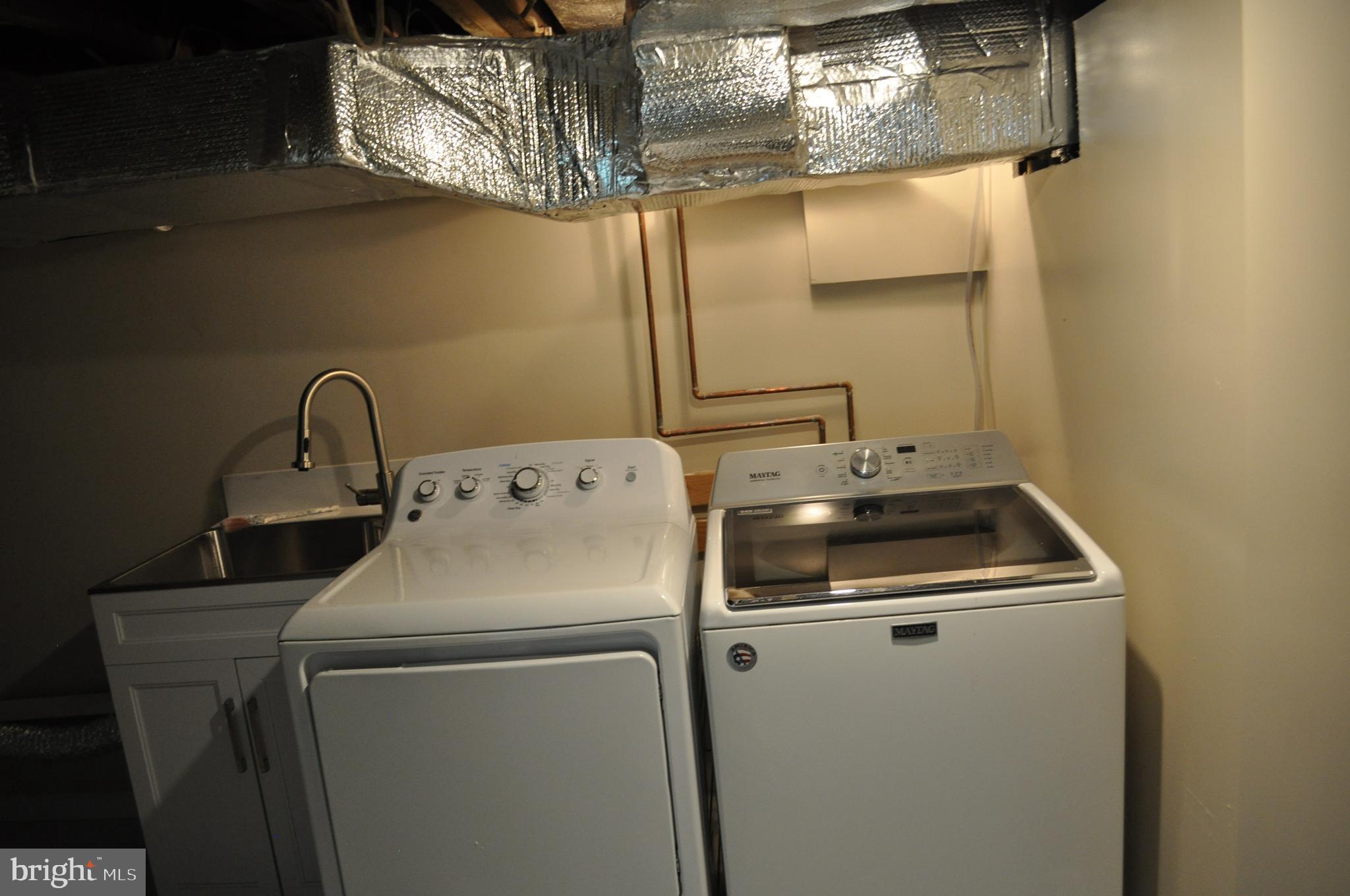 4302 Locust Lane Bethesda, MD 20816 - Photo 22 of 25 a utility room with dryer and washer