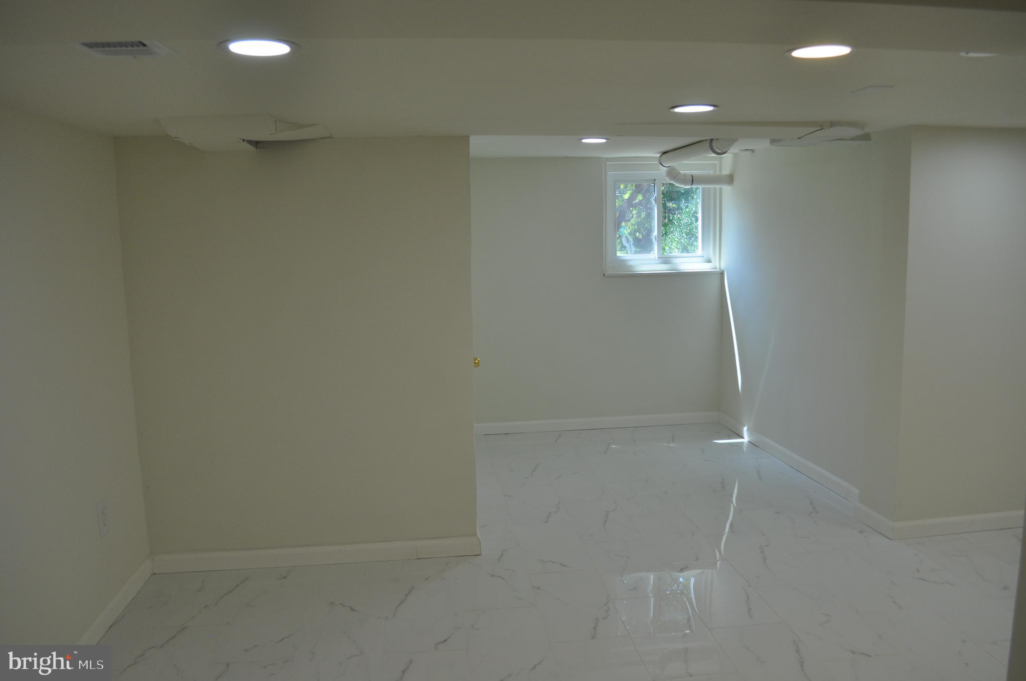 4302 Locust Lane Bethesda, MD 20816 - Photo 23 of 25 a view of an empty room