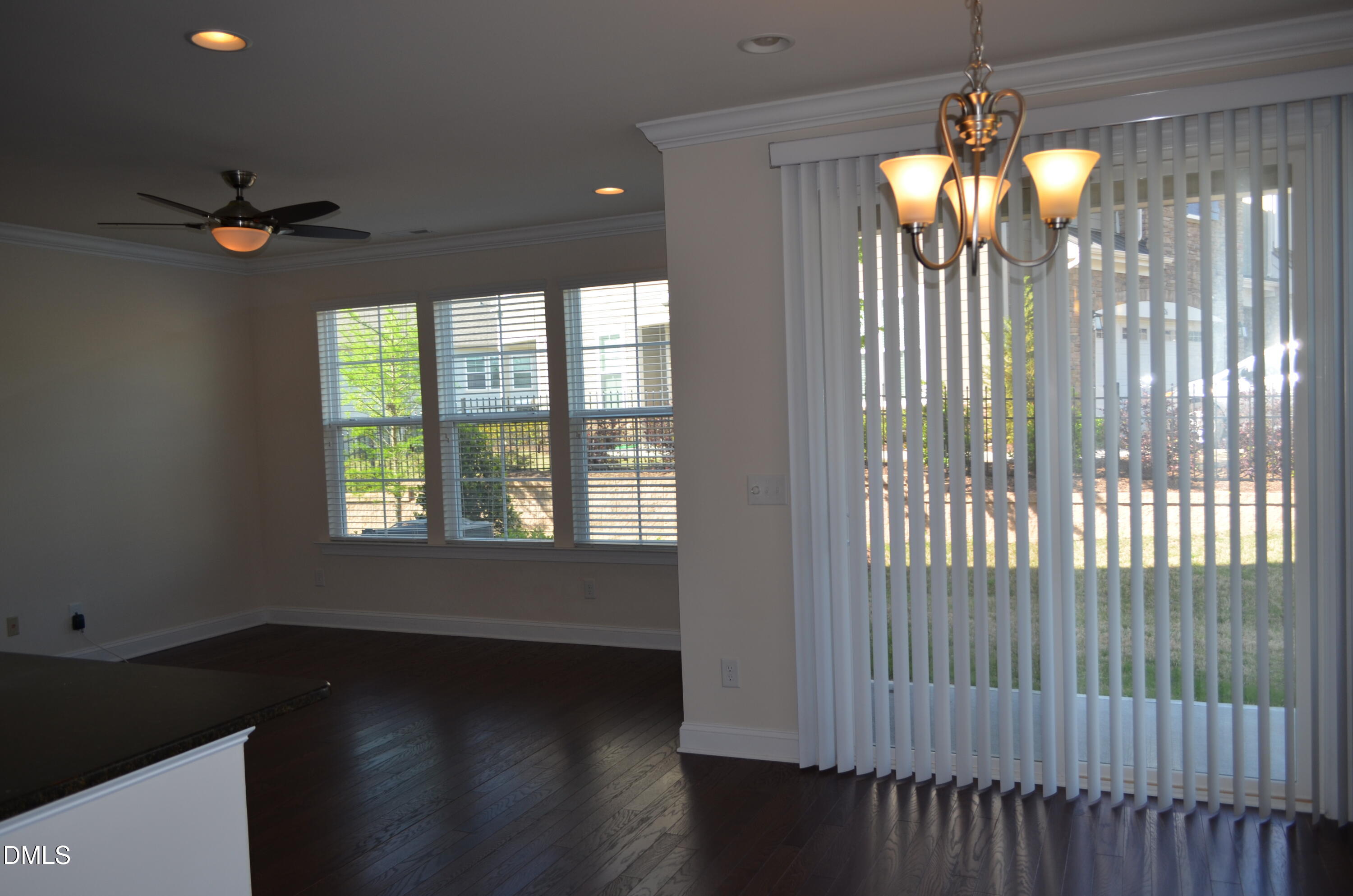 744 McRae Road Cary, NC 27519 - Photo 3 of 5 wooden floor in an empty room with a window