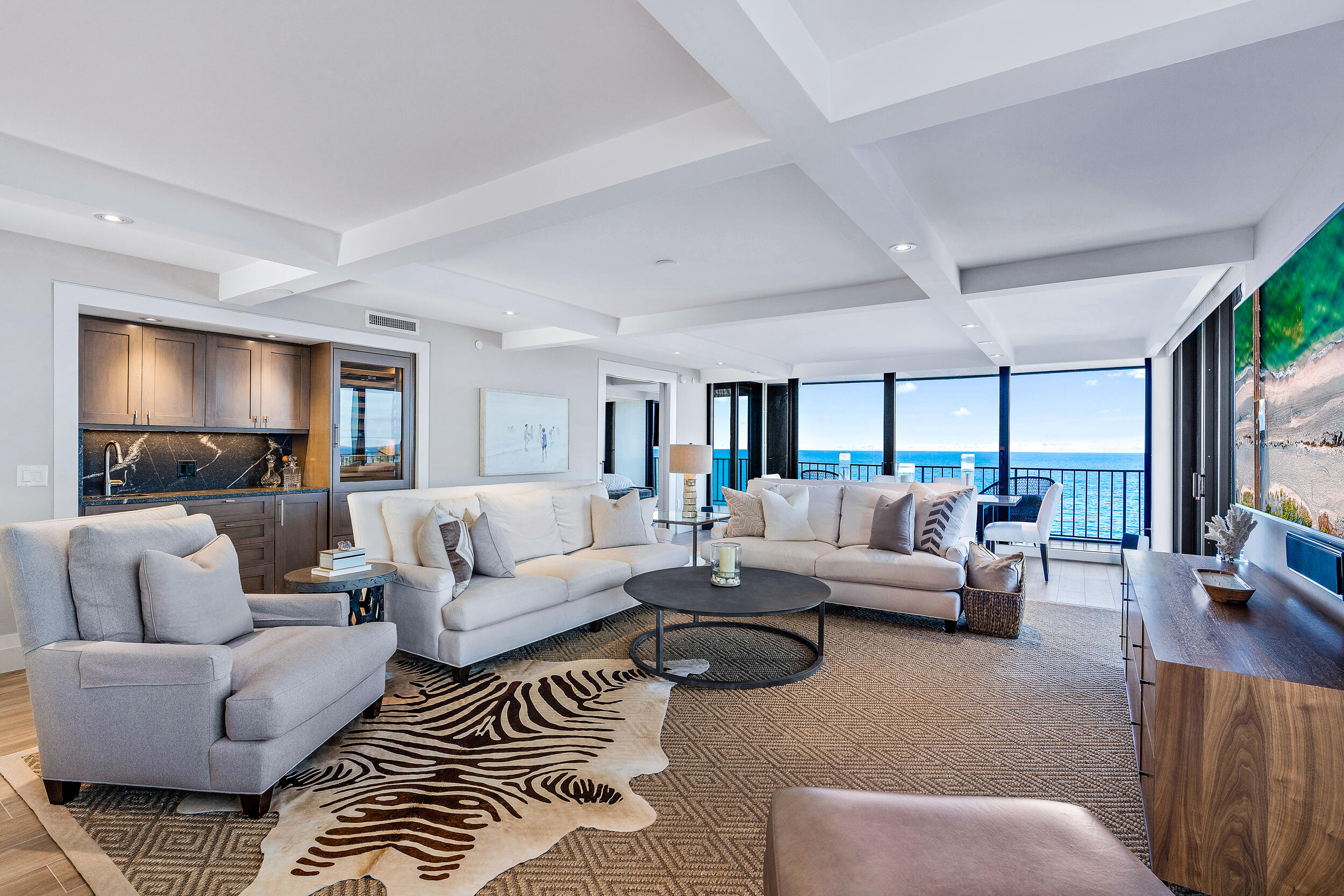 100 South Beach Road, Unit 604 Tequesta, FL 33469 - Photo 12 of 58 a living room with furniture or couch and a flat screen tv