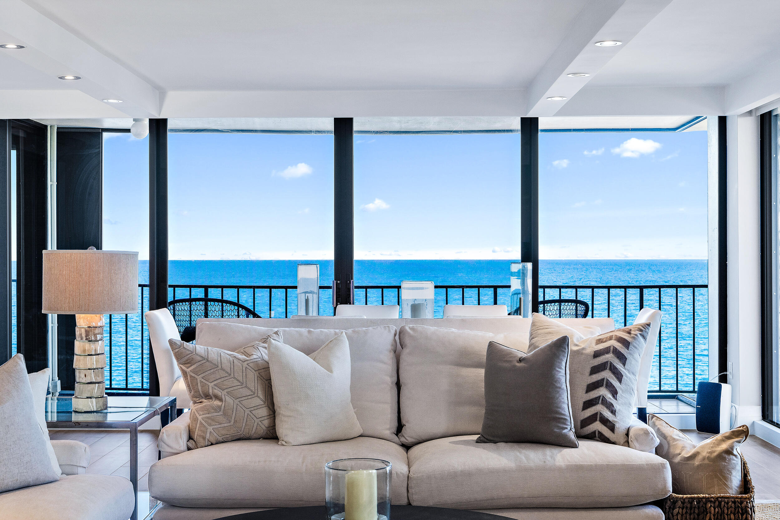 100 South Beach Road, Unit 604 Tequesta, FL 33469 - Photo 14 of 58 a balcony with furniture and large window