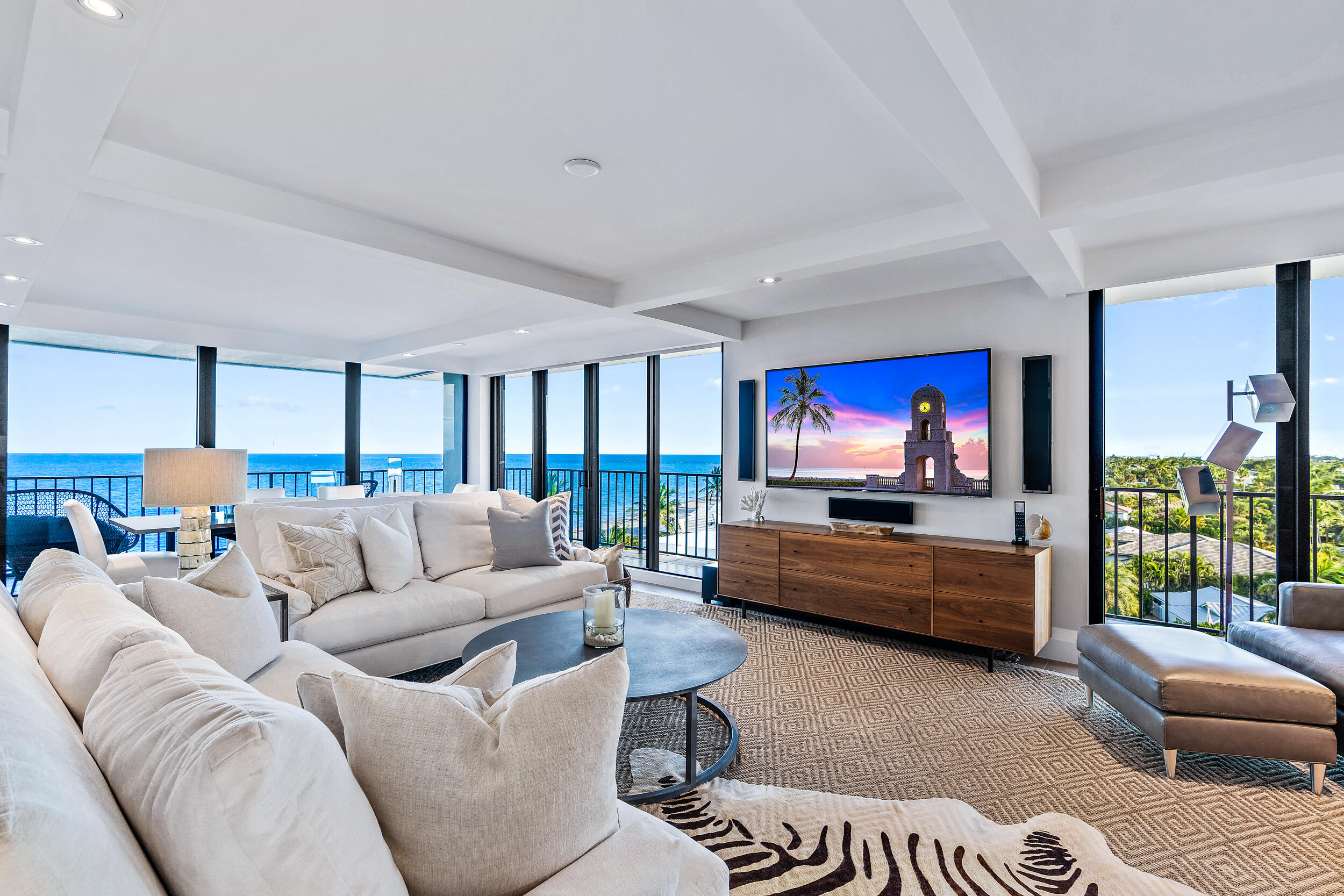 100 South Beach Road, Unit 604 Tequesta, FL 33469 - Photo 15 of 58 a living room with furniture and a flat screen tv