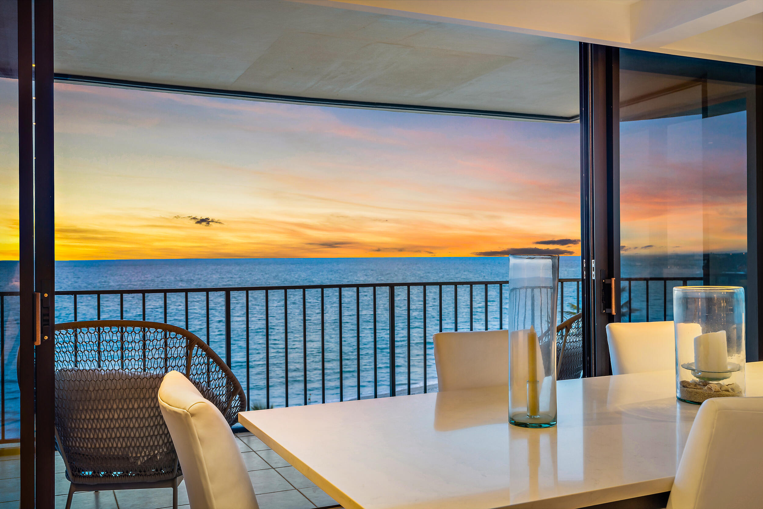 100 South Beach Road, Unit 604 Tequesta, FL 33469 - Photo 22 of 58 a view of a chair and tables the patio