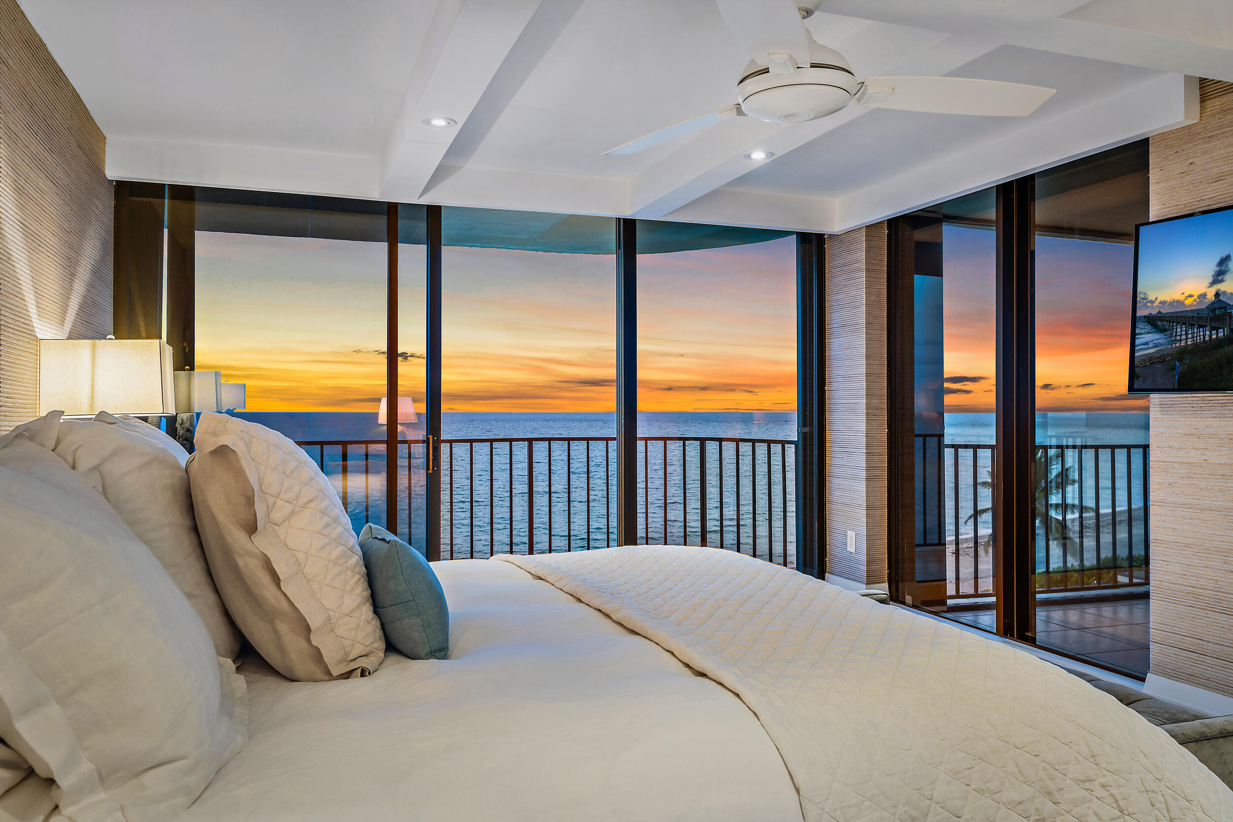 100 South Beach Road, Unit 604 Tequesta, FL 33469 - Photo 24 of 58 a bedroom with a large bed and a large window