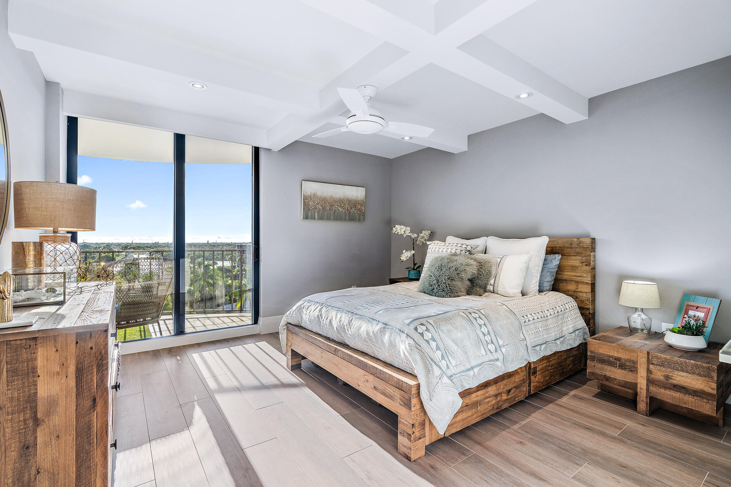 100 South Beach Road, Unit 604 Tequesta, FL 33469 - Photo 29 of 58 a bedroom with a large bed and a large window