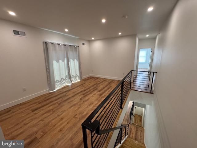 442 West Queen Lane, Unit 2 Philadelphia, PA 19144 - Photo 15 of 31 a view of a hallway with wooden floor and staircase