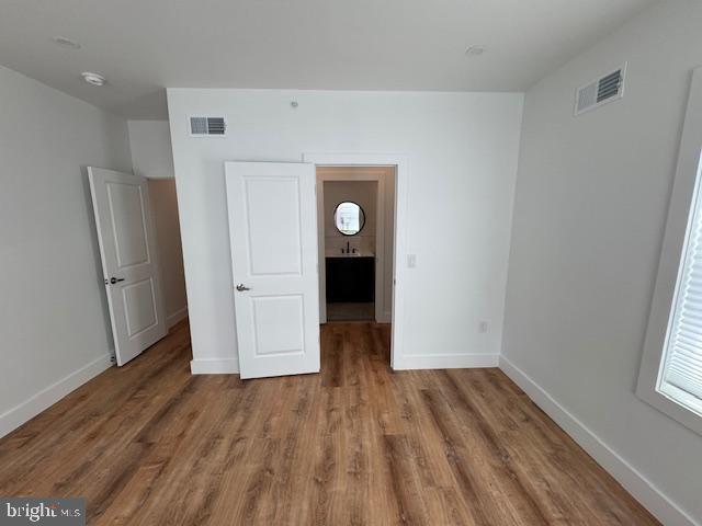 442 West Queen Lane, Unit 2 Philadelphia, PA 19144 - Photo 27 of 31 a view of an empty room with wooden floor