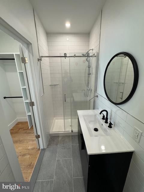 442 West Queen Lane, Unit 2 Philadelphia, PA 19144 - Photo 31 of 31 a bathroom with a sink a mirror and a shower