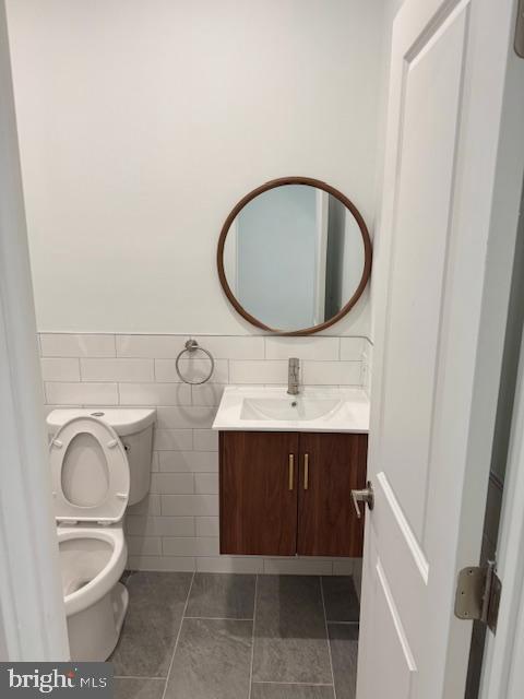 442 West Queen Lane, Unit 2 Philadelphia, PA 19144 - Photo 7 of 31 a bathroom with a toilet sink and mirror