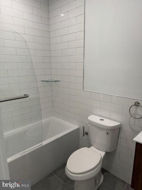 442 West Queen Lane, Unit 2 Philadelphia, PA 19144 - Photo 8 of 31 a white toilet and tub sitting next to a bathroom sink