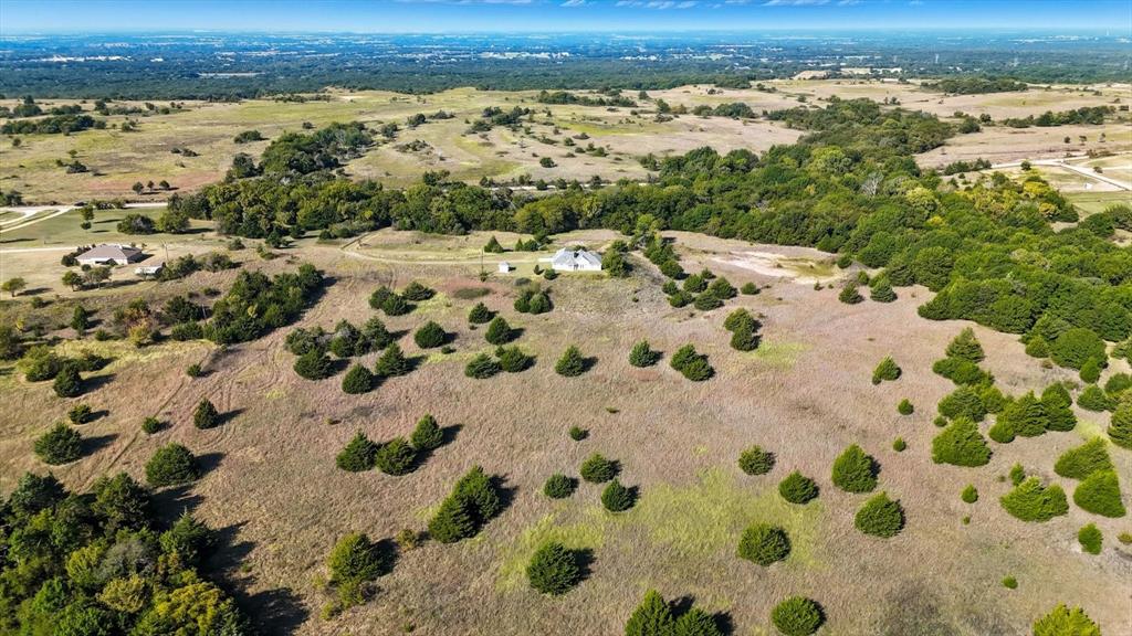 2296 Old Decatur Road Decatur, TX 76234 - Photo 34 of 39 Aerial view of property and surrounding area featuring rural landscape