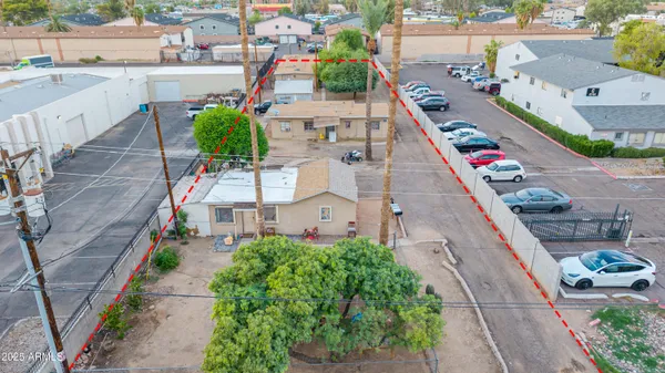 a aerial view of a house with an outdoor space
