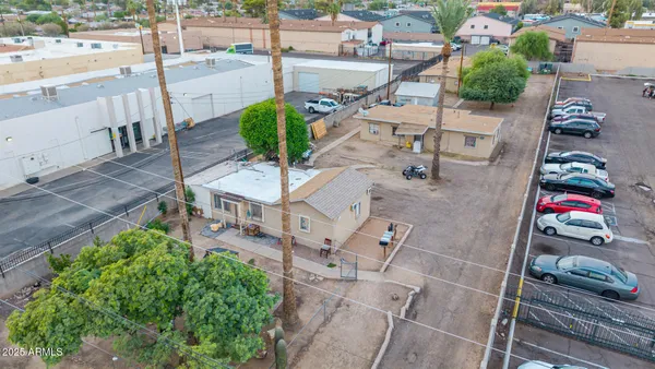 an aerial view of residential houses and outdoor space