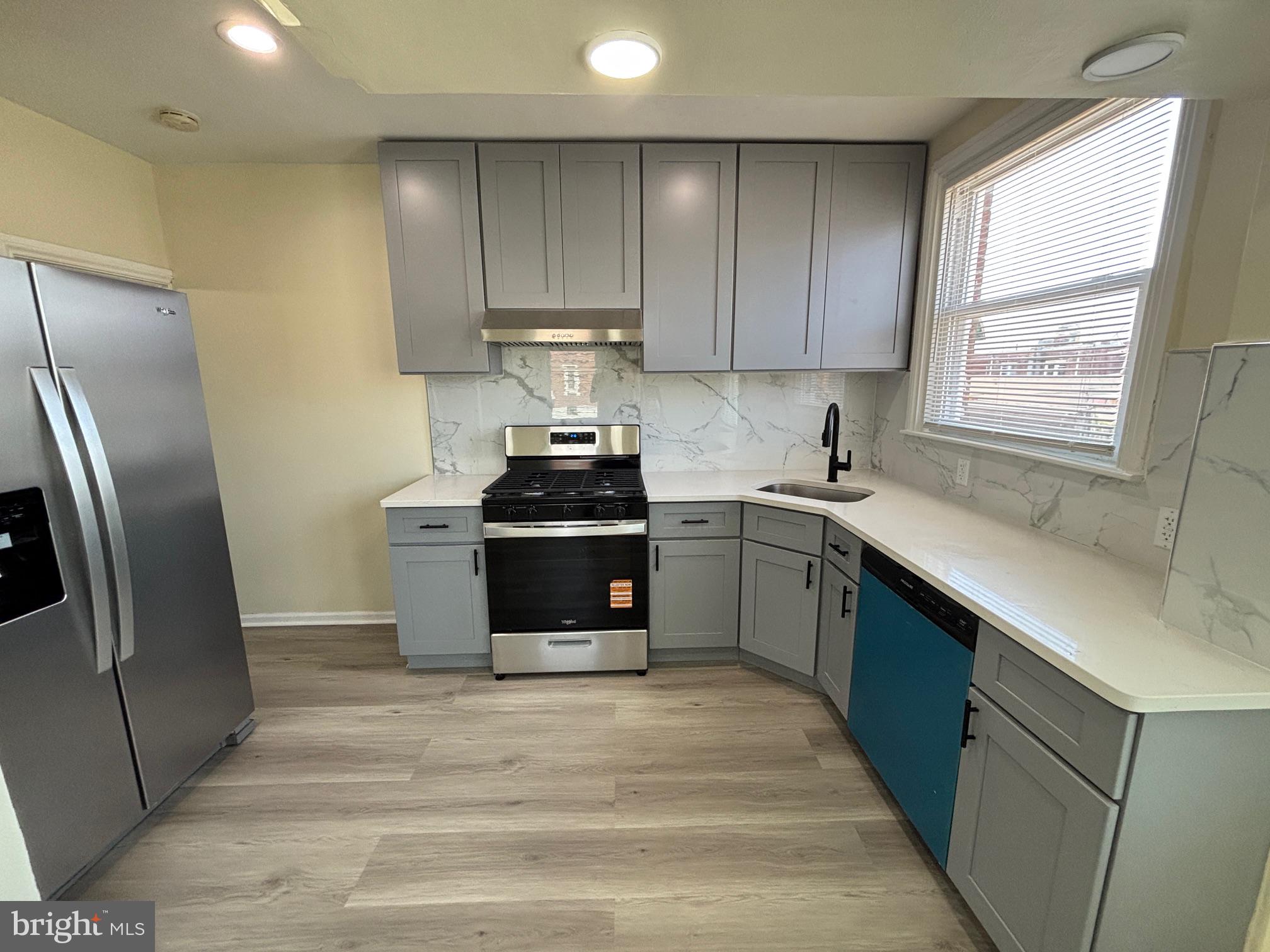 6658 Rutland Street Philadelphia, PA 19149 - Photo 6 of 22 Modern kitchen with sleek finishes.