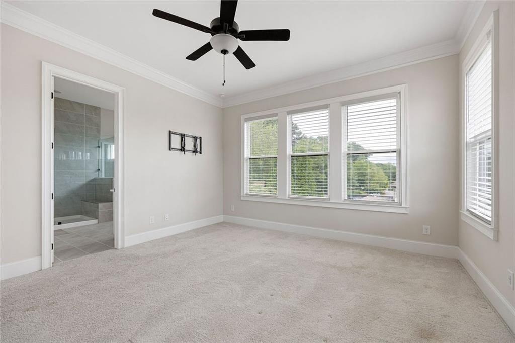 109 Village Green Avenue Woodstock, GA 30189 - Photo 19 of 37 wooden floor in an empty room with a window