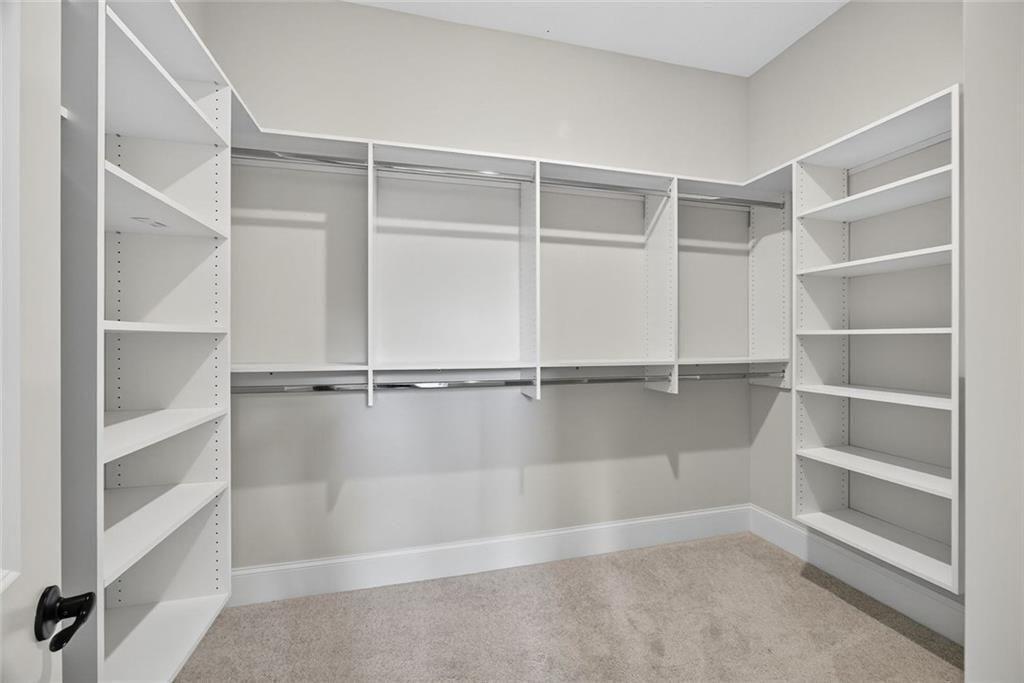 109 Village Green Avenue Woodstock, GA 30189 - Photo 24 of 37 a view of an empty walk in closet