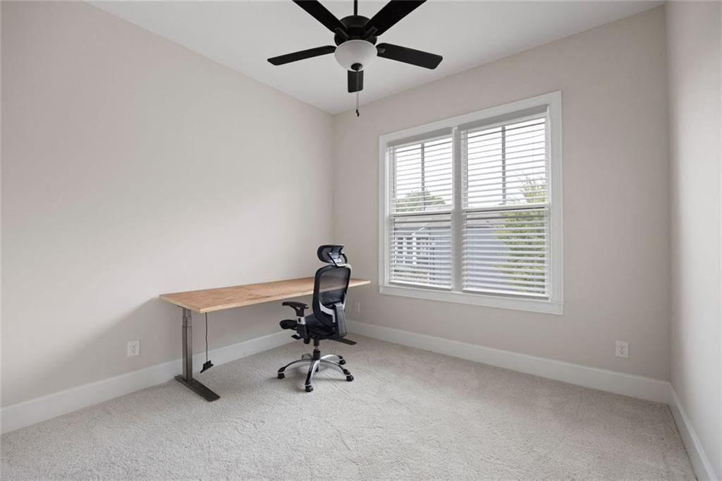 109 Village Green Avenue Woodstock, GA 30189 - Photo 28 of 37 a view of a workspace with a window