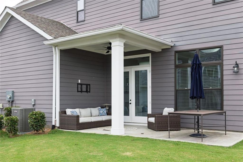 109 Village Green Avenue Woodstock, GA 30189 - Photo 31 of 37 a view of house with backyard space and garden