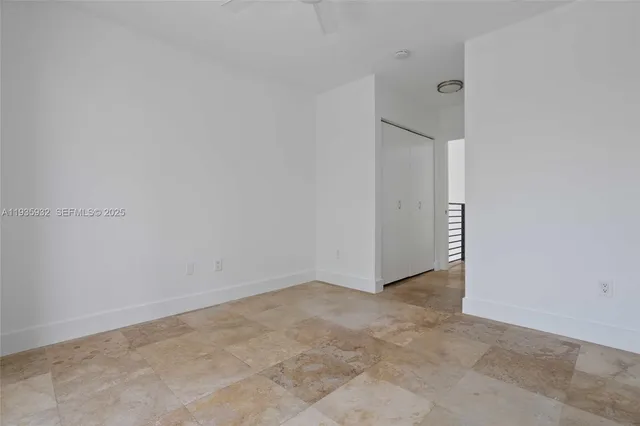 en view of an empty room with a window