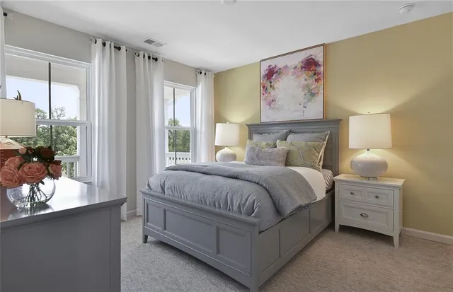 a bathroom with a sink toilet and a mirror