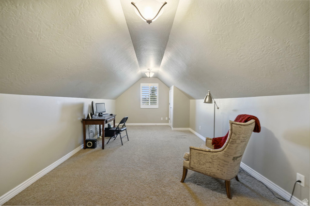 557 South 1470th Street East Springville, UT 84663 - Photo 23 of 46 Family Room area featuring light carpet and a textured ceiling