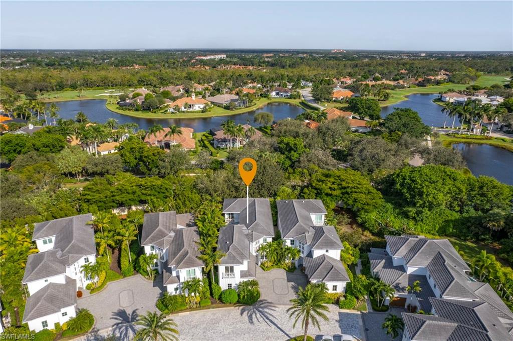 9149 Mercato Way Naples, FL 34108 - Photo 45 of 47 an aerial view of residential houses with outdoor space