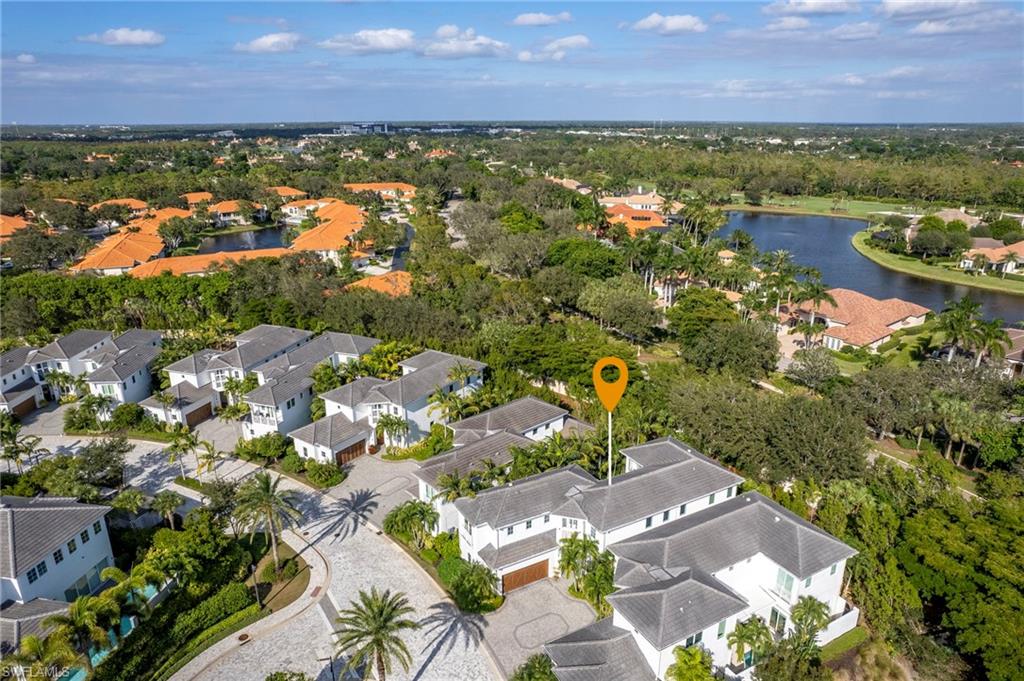 9149 Mercato Way Naples, FL 34108 - Photo 47 of 47 an aerial view of residential house with outdoor space and lake view