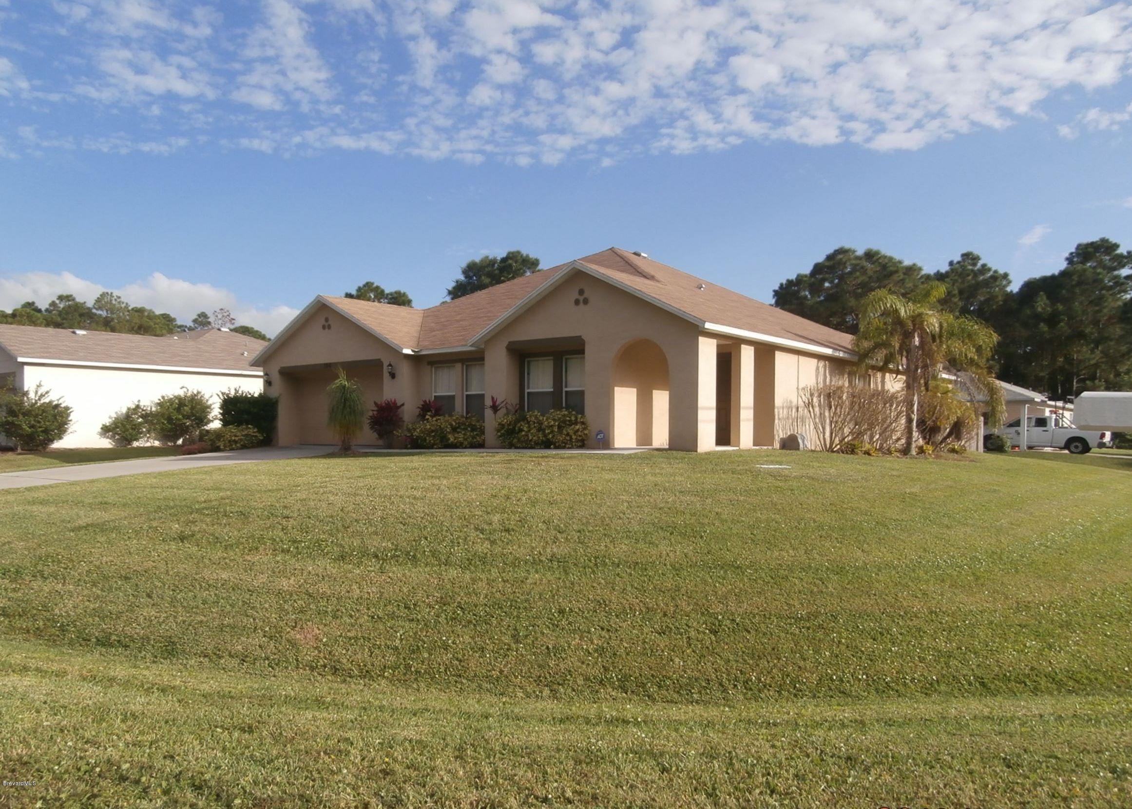 196 Scotch Street Southwest Palm Bay, FL 32908 - Photo 2 of 24 Front1