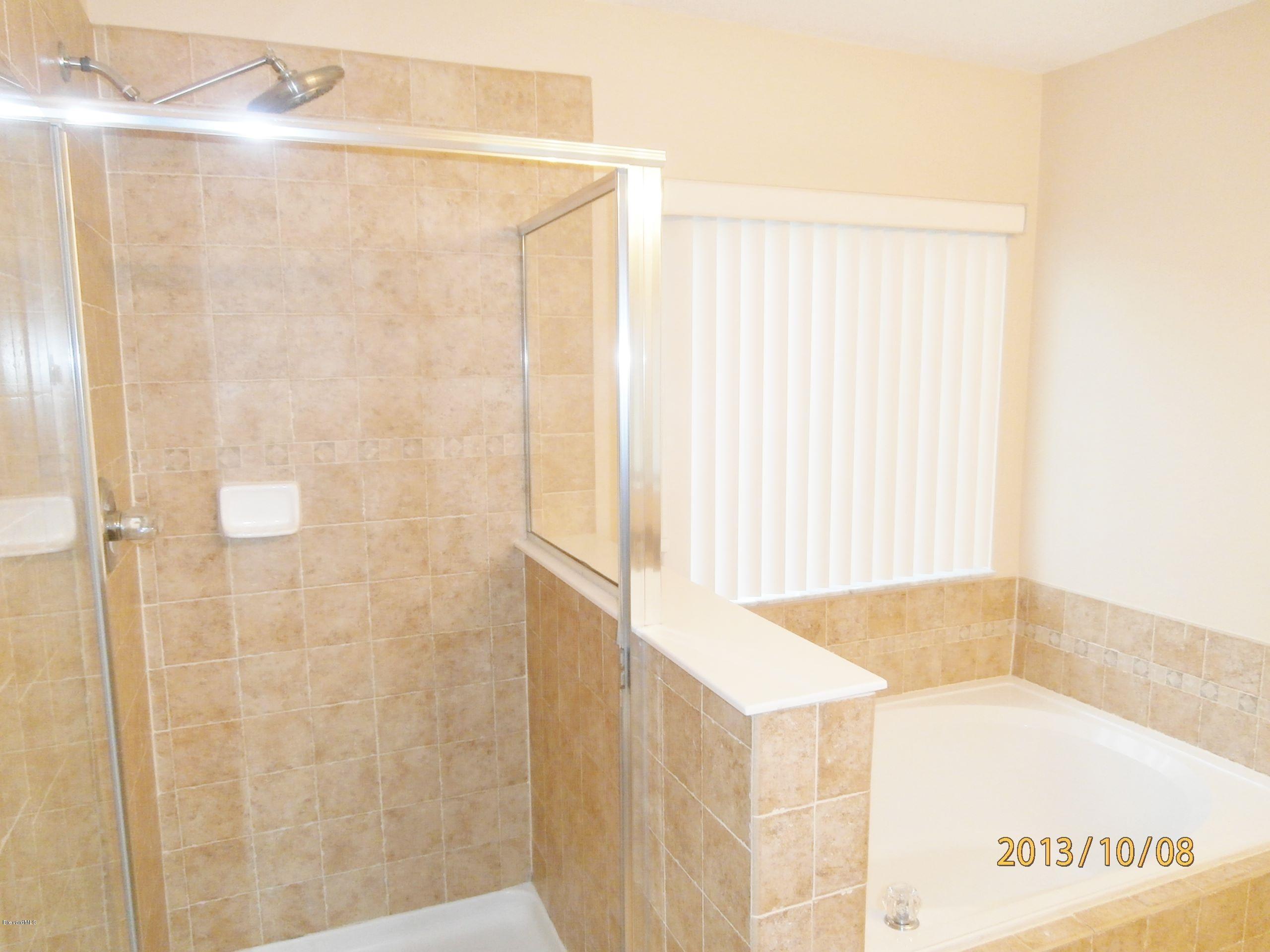 196 Scotch Street Southwest Palm Bay, FL 32908 - Photo 15 of 24 Scotch master bath 2